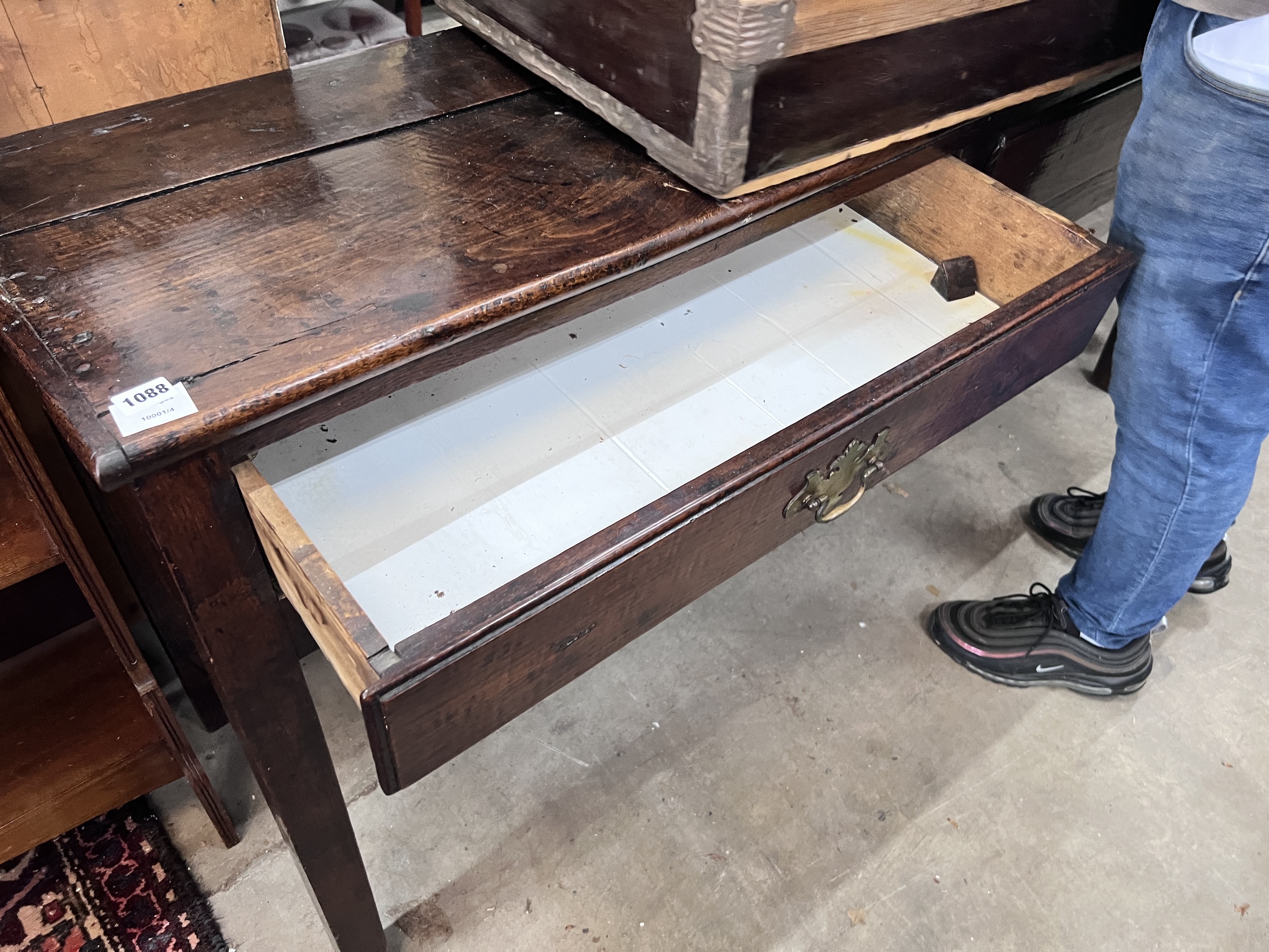 An 18th century oak low dresser, fitted two drawers, width 168cm, depth 45cm, height 78cm